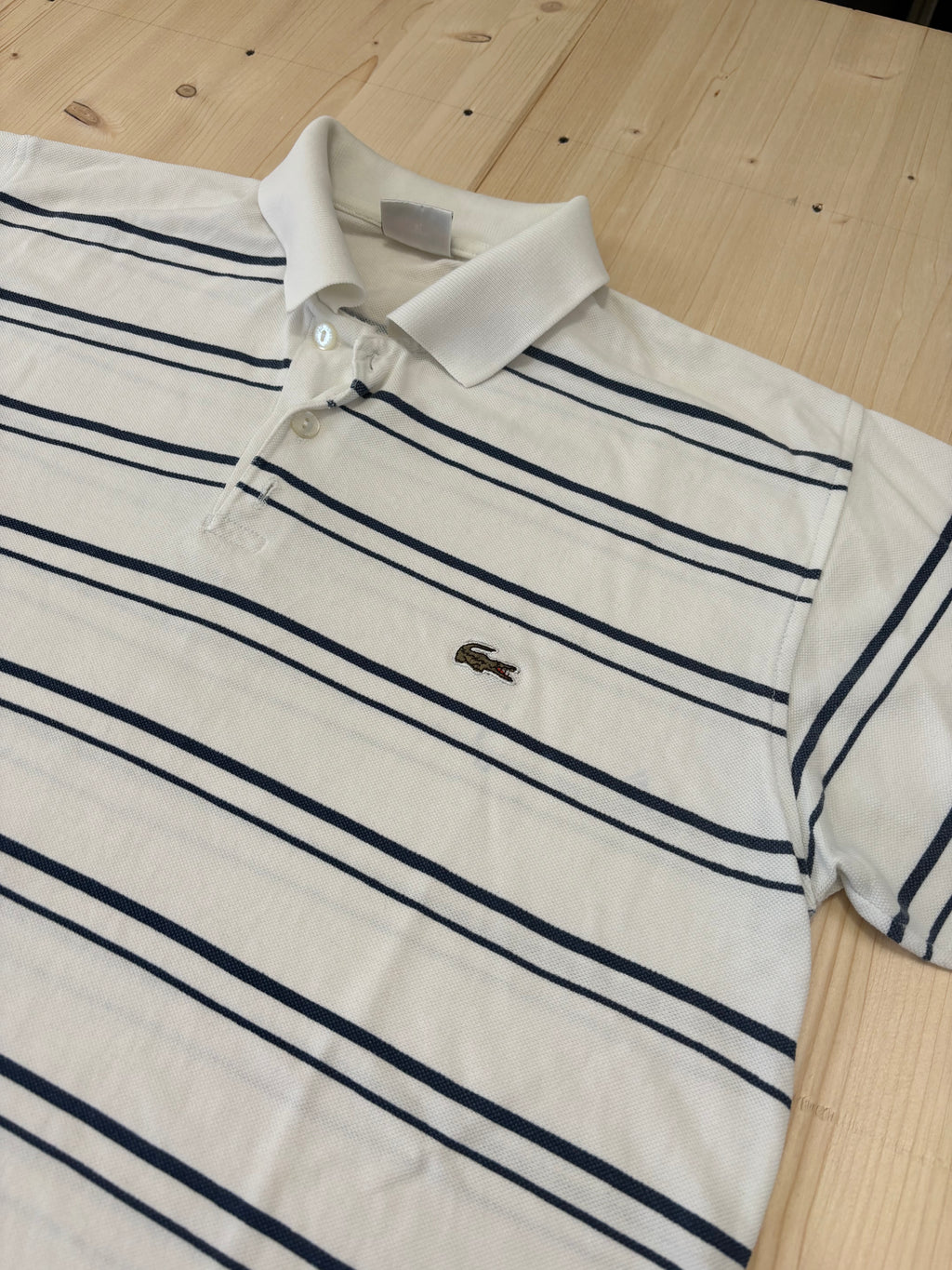 Polo Lacoste Uomo Bianca a Righe Blu con Logo Ricamato