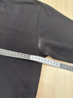 Polo Lacoste Uomo Nera con Logo Ricamato e Patch sulla Manica