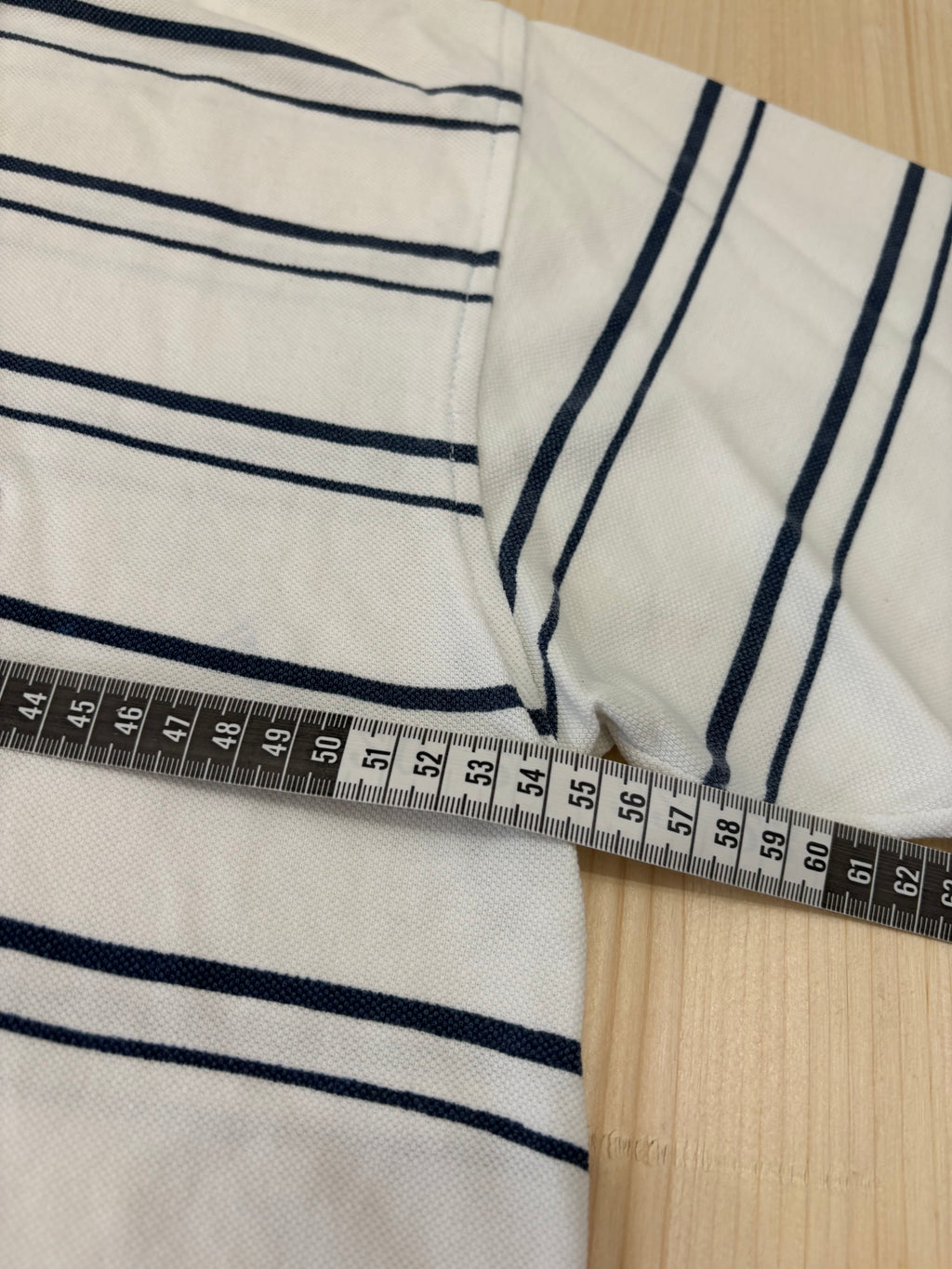 Polo Lacoste Uomo Bianca a Righe Blu con Logo Ricamato