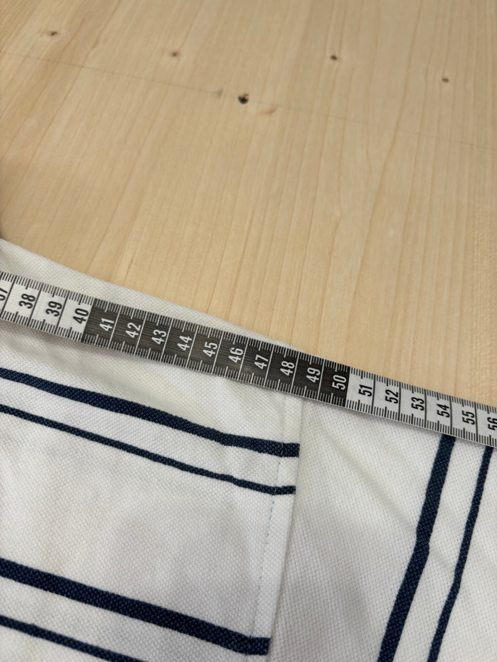 Polo Lacoste Uomo Bianca a Righe Blu con Logo Ricamato