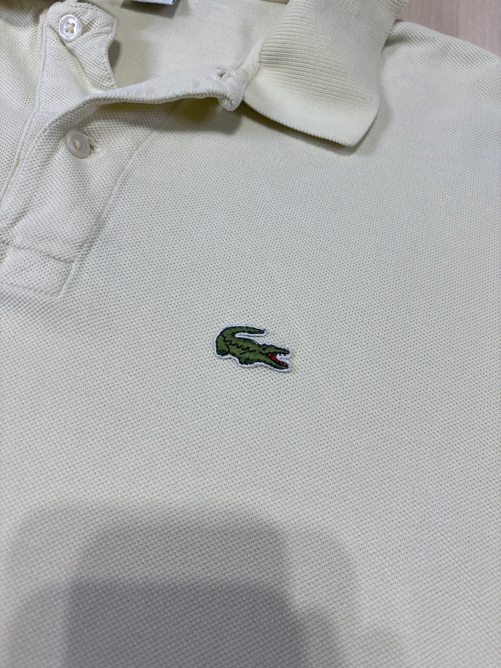 Polo Lacoste Uomo Avorio con Logo Ricamato – Regular Fit