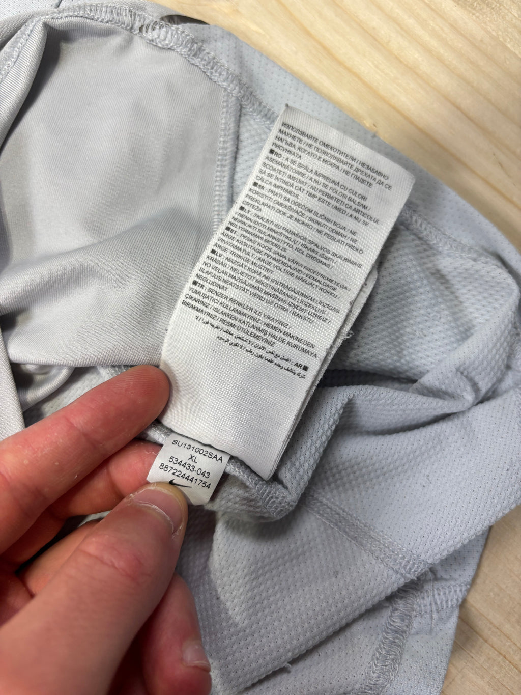 T-Shirt Nike Running Grigia