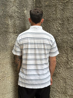 Polo Lacoste Uomo Bianca a Righe Blu con Logo Ricamato
