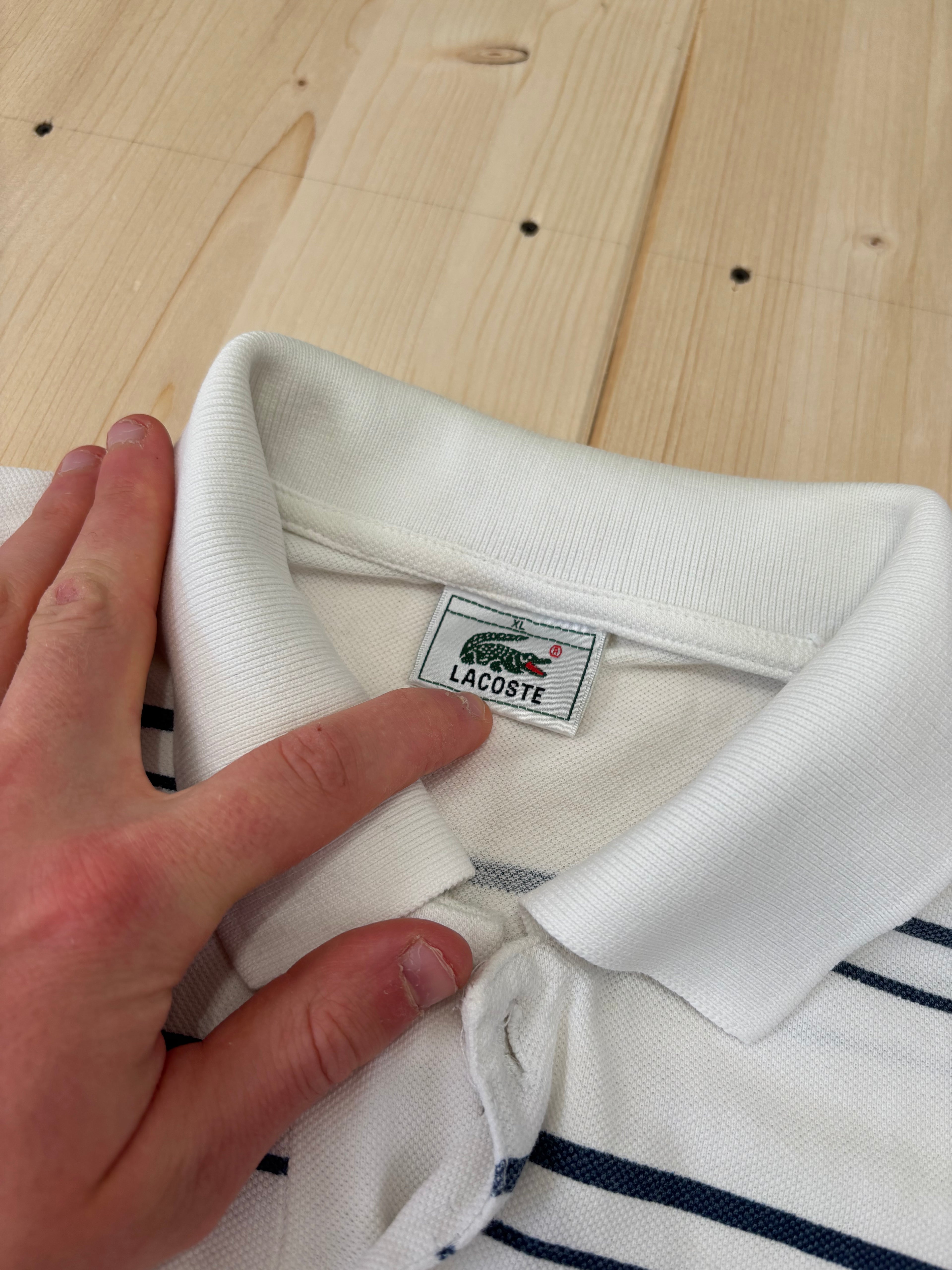 Polo Lacoste Uomo Bianca a Righe Blu con Logo Ricamato