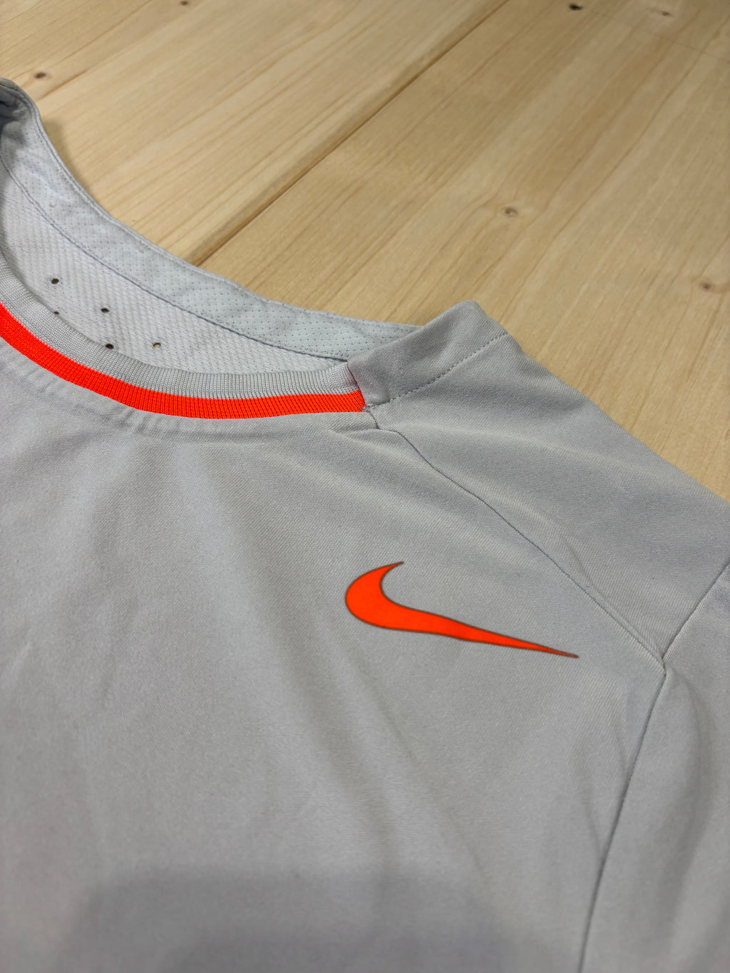T-Shirt Nike Running Grigia