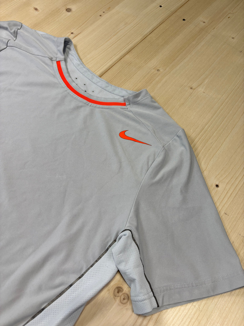 T-Shirt Nike Running Grigia