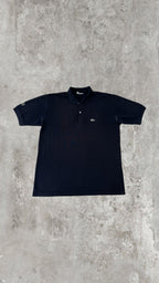 Polo Lacoste Uomo Nera con Logo Ricamato e Patch sulla Manica