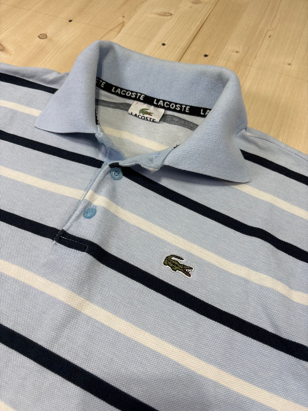 Polo Lacoste Uomo Azzurro Chiaro a Righe Orizzontali con Logo